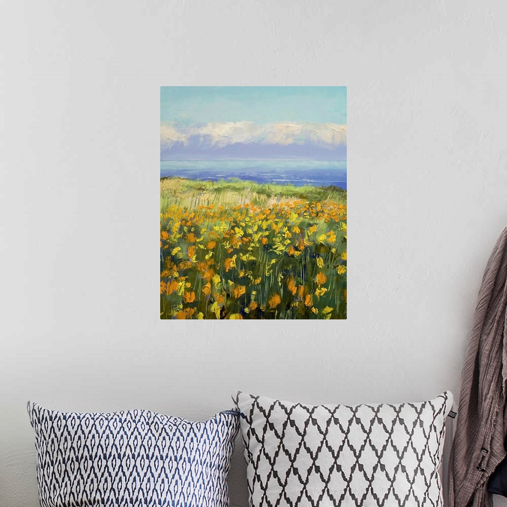 A bohemian room featuring Canvas painting of a large field of poppies stretching to the sea. Vibrant coloring of the poppie...