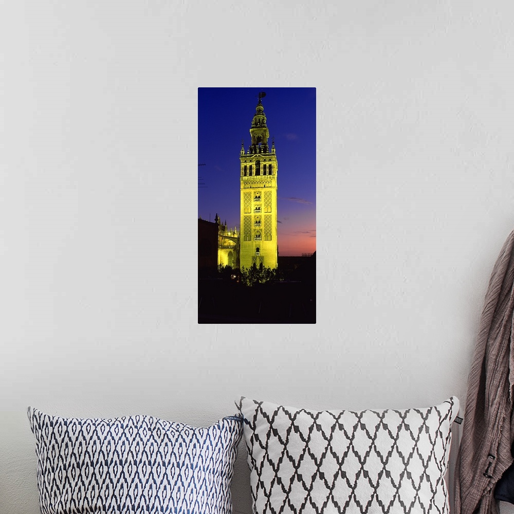 A bohemian room featuring La Giralda viewed from Almohad mosque,, Seville Cathedral, Barrio De Santa Cruz, Seville, Andalus...