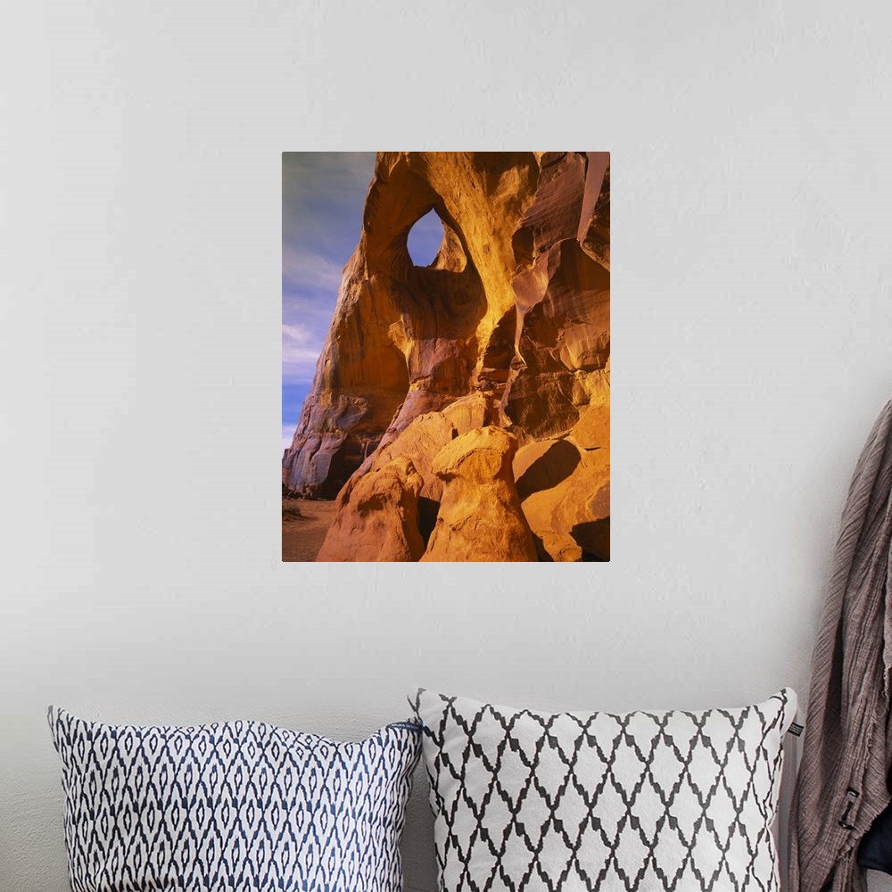 A bohemian room featuring Low angle view of a natural arch, Suns Eye Arch, Monument Valley Tribal Park, Arizona