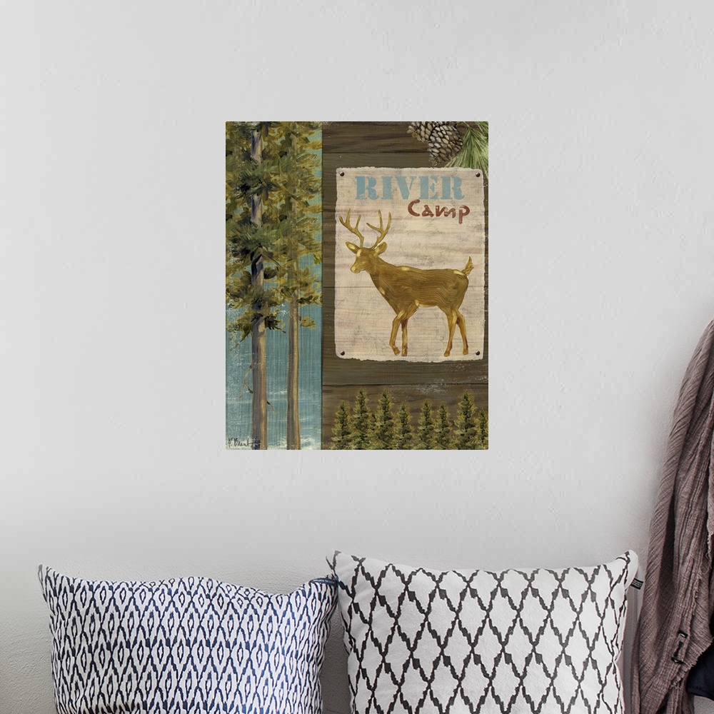 A bohemian room featuring Decorative artwork of forest elements such as a sign with a deer, trees, and pinecones.