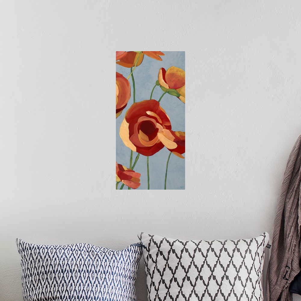 A bohemian room featuring Contemporary artwork of vibrant red flowers.