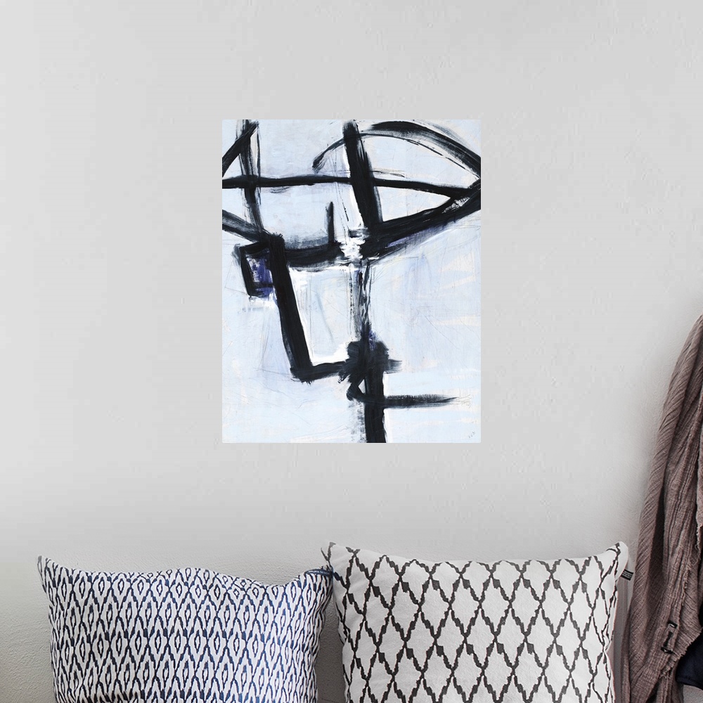 A bohemian room featuring Contemporary abstract artwork with lined movement in black on a light blue background.