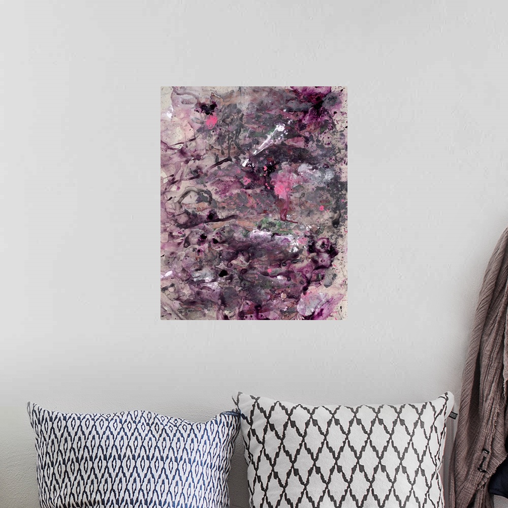 A bohemian room featuring Contemporary abstract painting consisting of pink, purple, and black paint splatter design on a b...