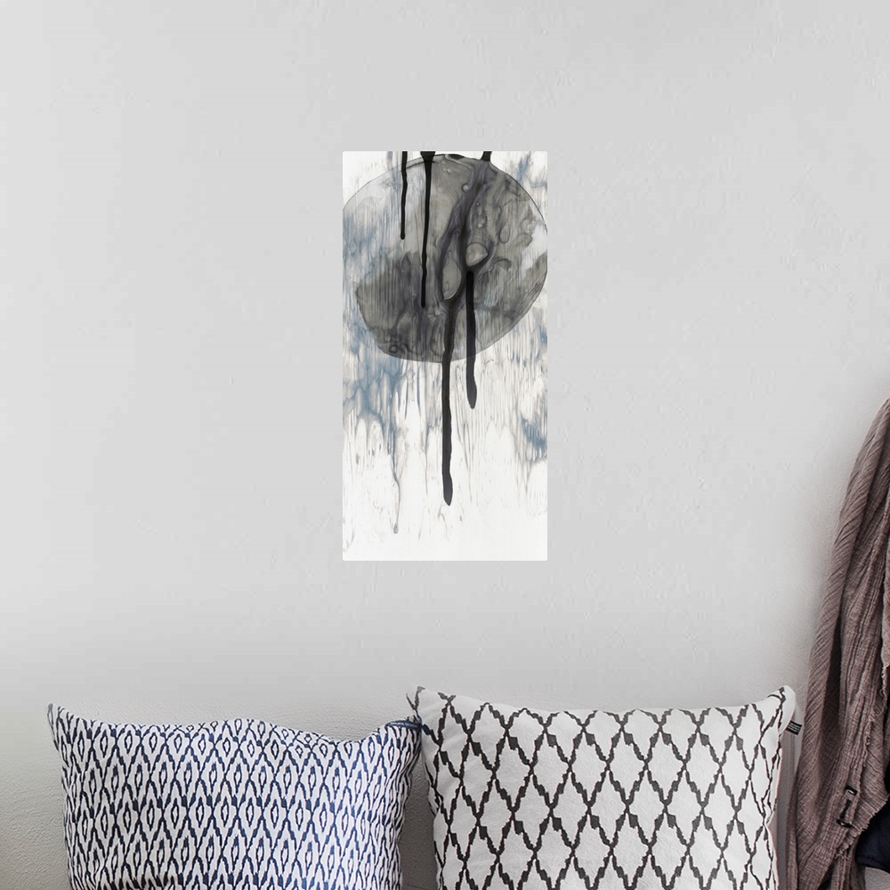 A bohemian room featuring A long vertical painting of washed circular designs with black lines with gray drips of paint.