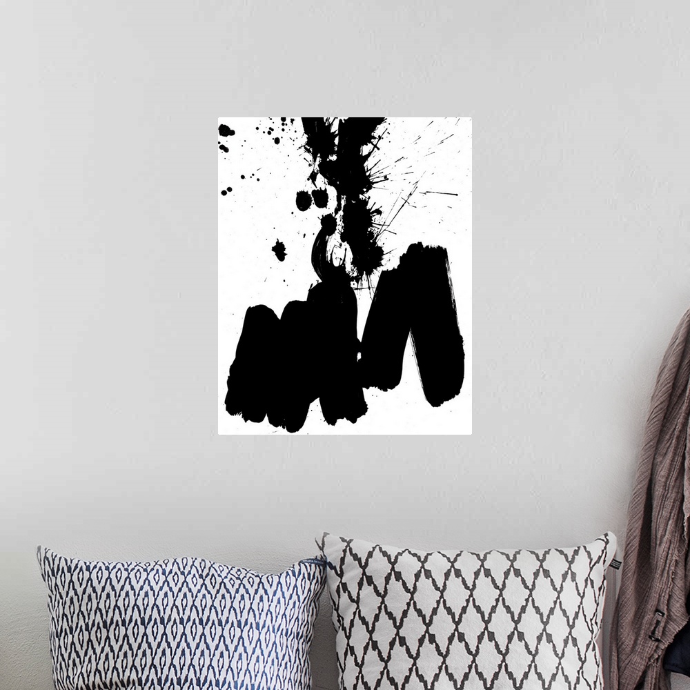 A bohemian room featuring Contemporary abstract home decor artwork using black paint splashes against a white background.
