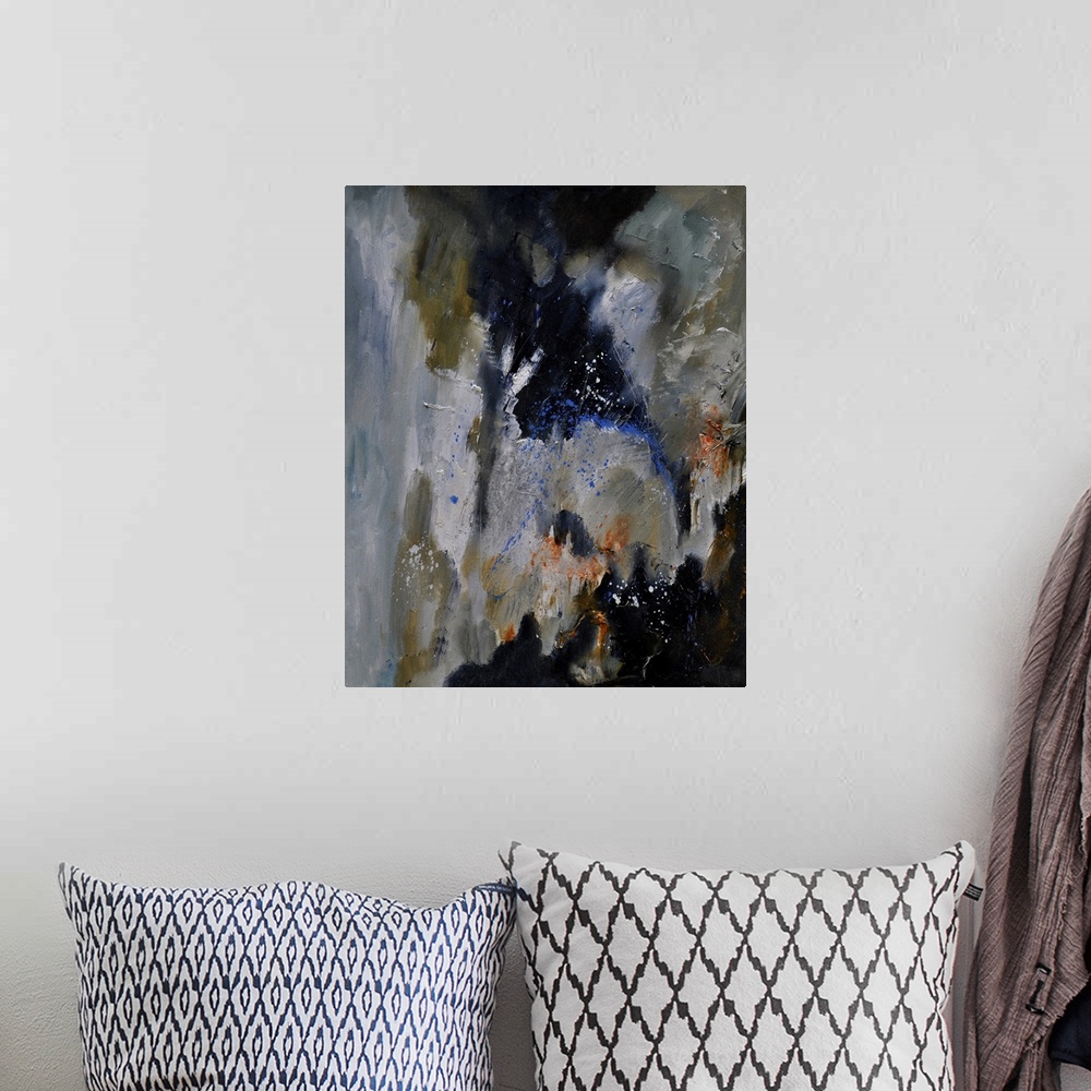 A bohemian room featuring Abstract painting of colors of gray, brown and blue with hints of orange in textured brush stroke...