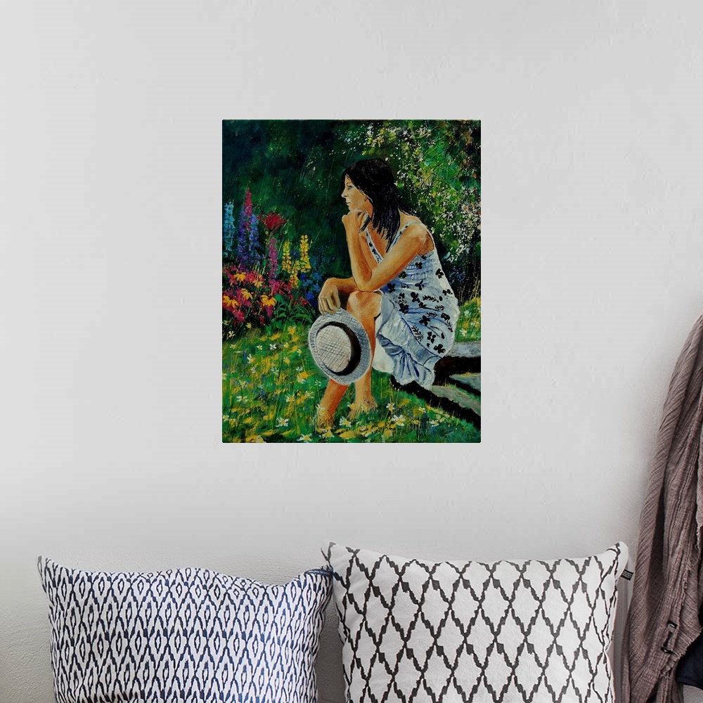 A bohemian room featuring Vertical portrait of a woman sitting in a garden full of blooming flowers in the spring.
