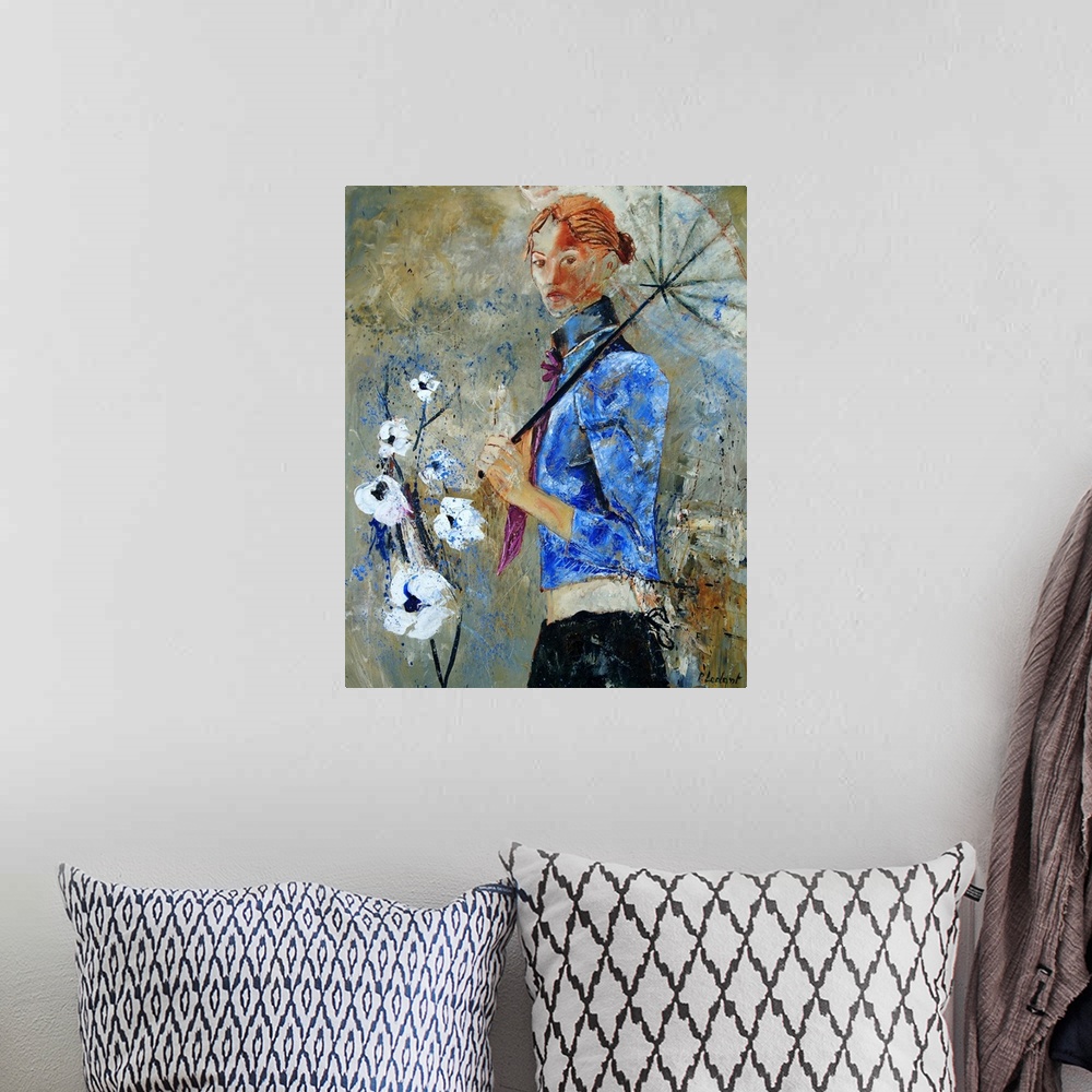 A bohemian room featuring Vertical portrait of a woman in a blue jacket holding an umbrella with white flowers in front of ...