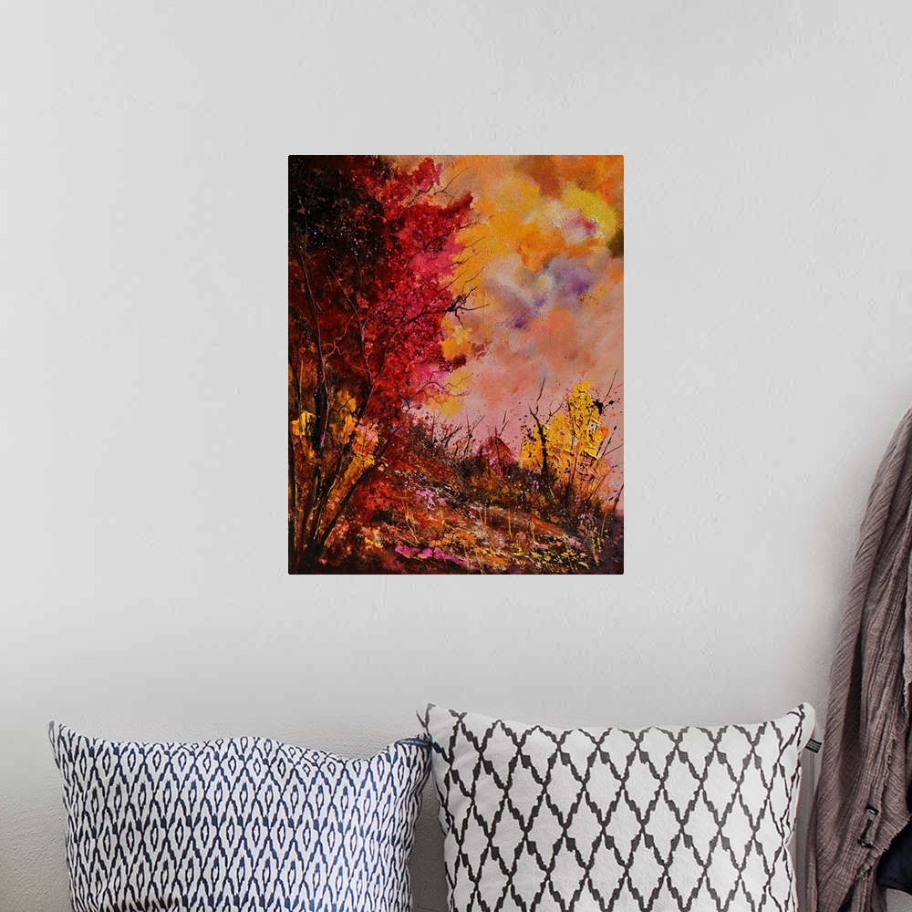 A bohemian room featuring Vertical painting of a group of red leaved trees in the fall with speckles of paint overlapping.