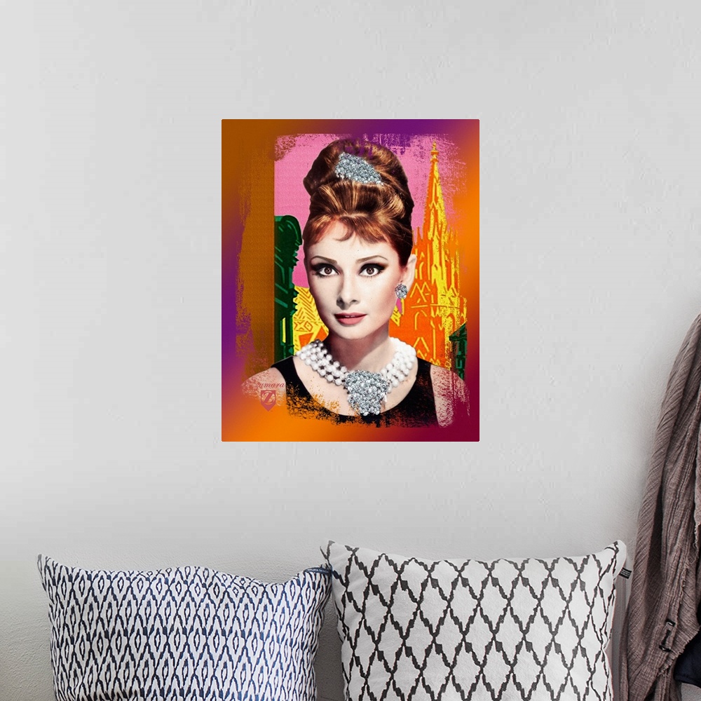 A bohemian room featuring Portrait artwork on a large wall hanging of a bust image of Audrey Hepburn wearing a large, jewel...
