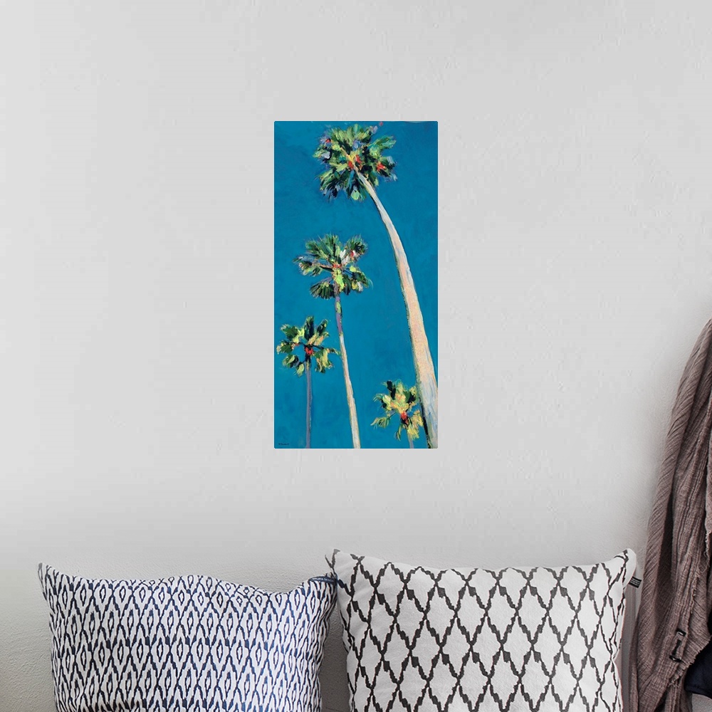 A bohemian room featuring Blue Sky and Palm Trees, A Little Piece of Heaven, painting by artist RD Riccoboni.