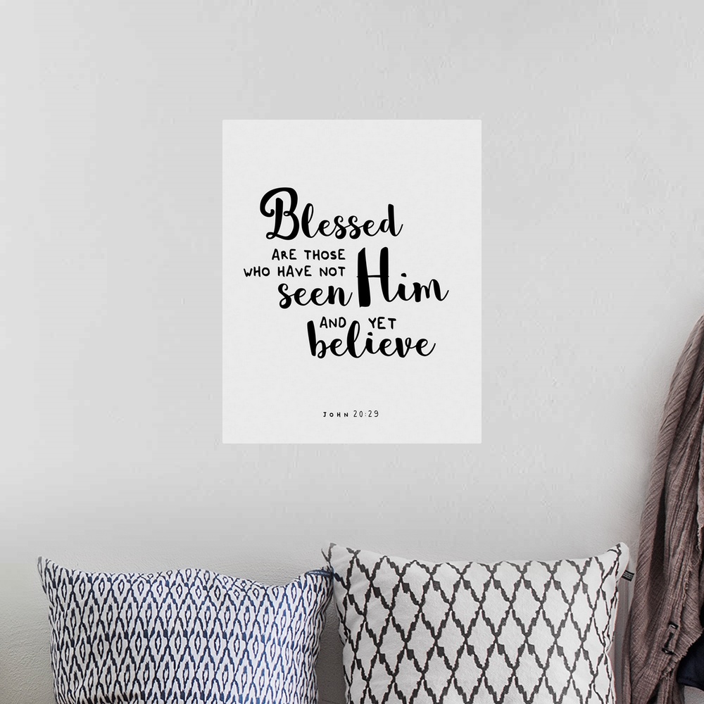 A bohemian room featuring Handlettered Bible verse reading Blessed are those who have no seen Him and yet believe.
