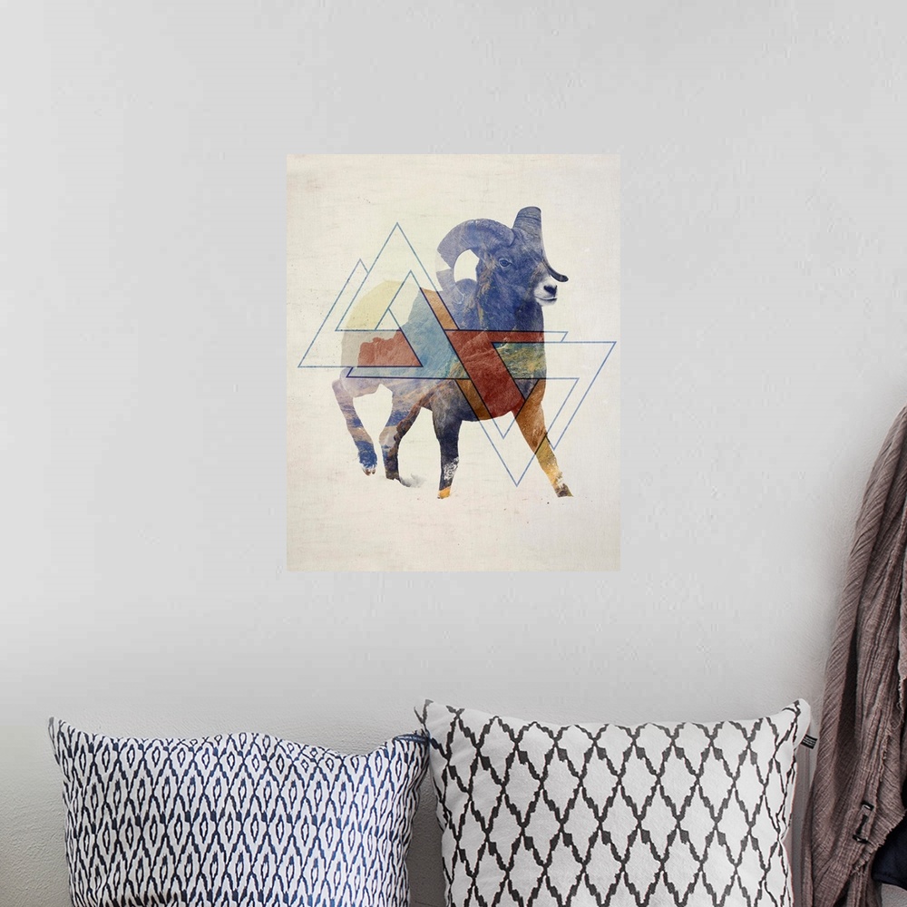 A bohemian room featuring Double exposure artwork of a bighorn sheep ram and mountains with triangular shapes.