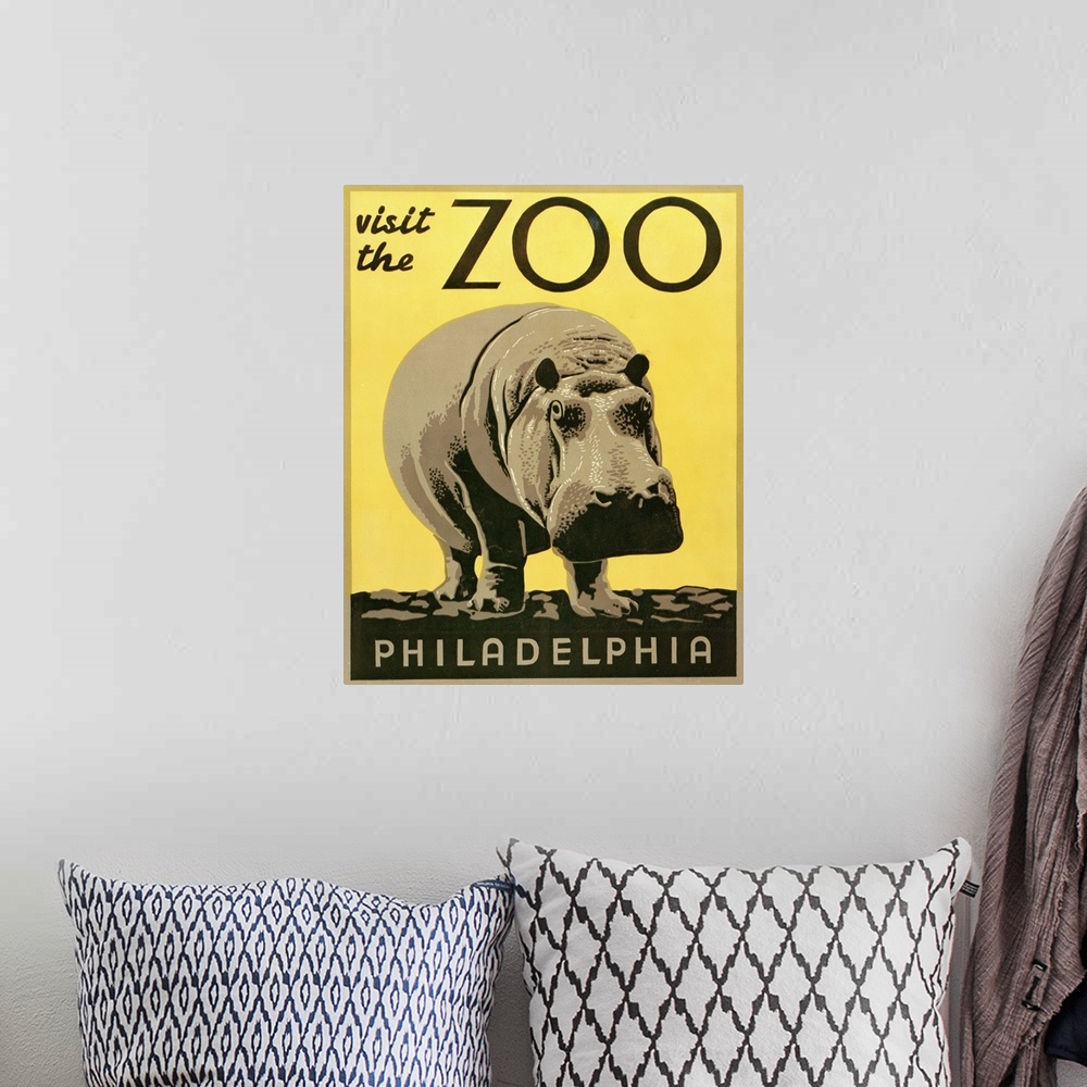 A bohemian room featuring Visit the zoo, Philadelphia. Poster promoting the zoo as a place to visit, showing a hippopotamus...