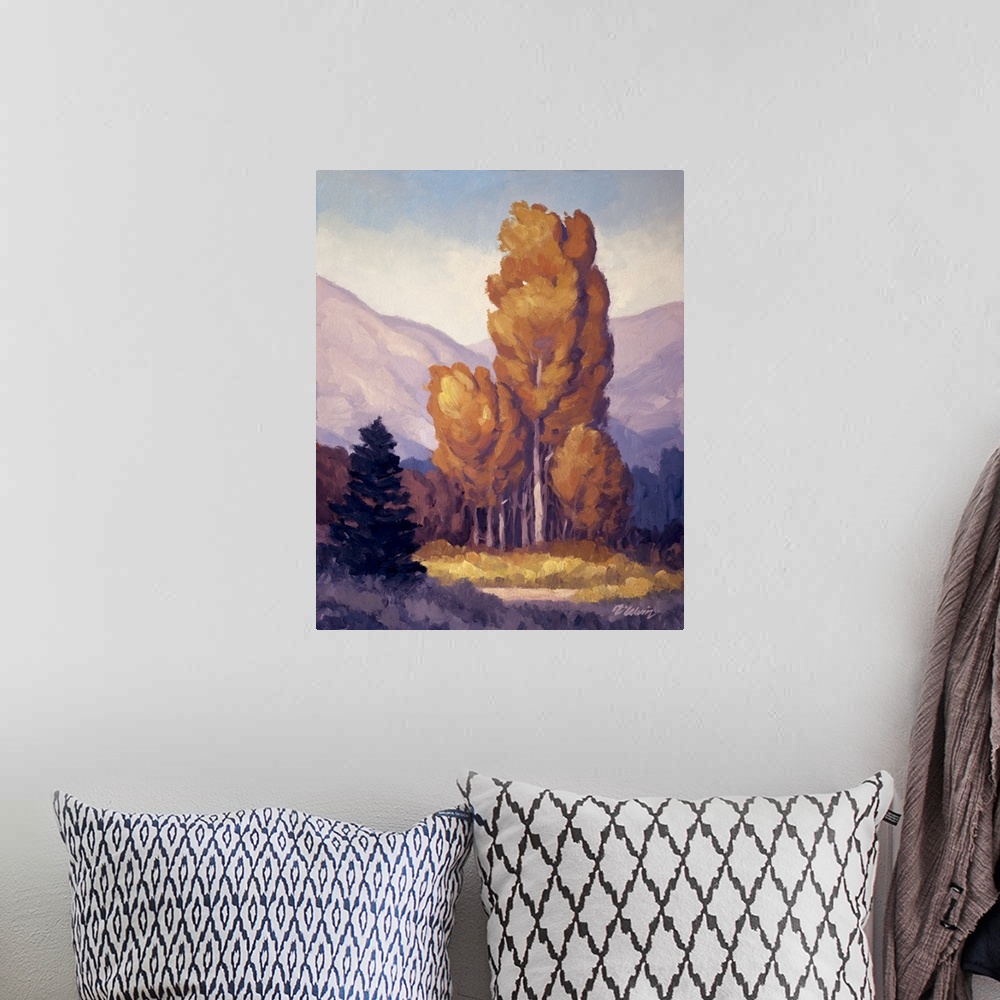 A bohemian room featuring Landscape painting of trees and mountains with purple tones.