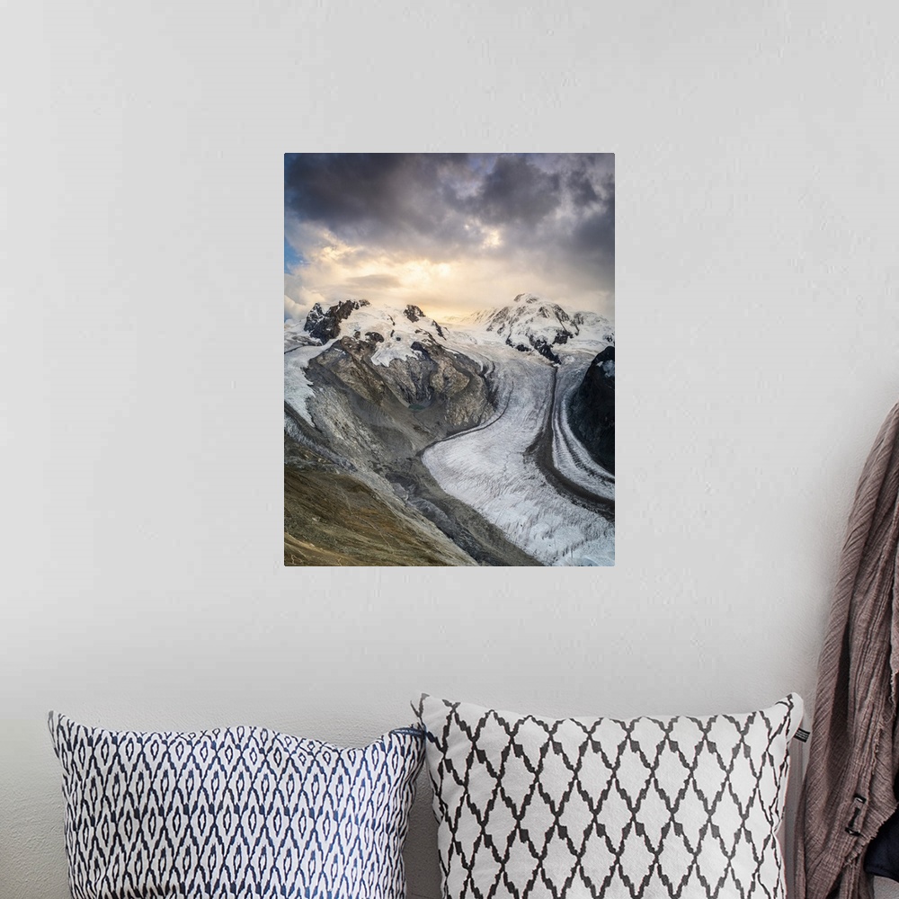 A bohemian room featuring Gorner Glacier (Gornergletscher) with majestic Lyskamm and Monte Rosa peaks at sunset, Zermatt, V...