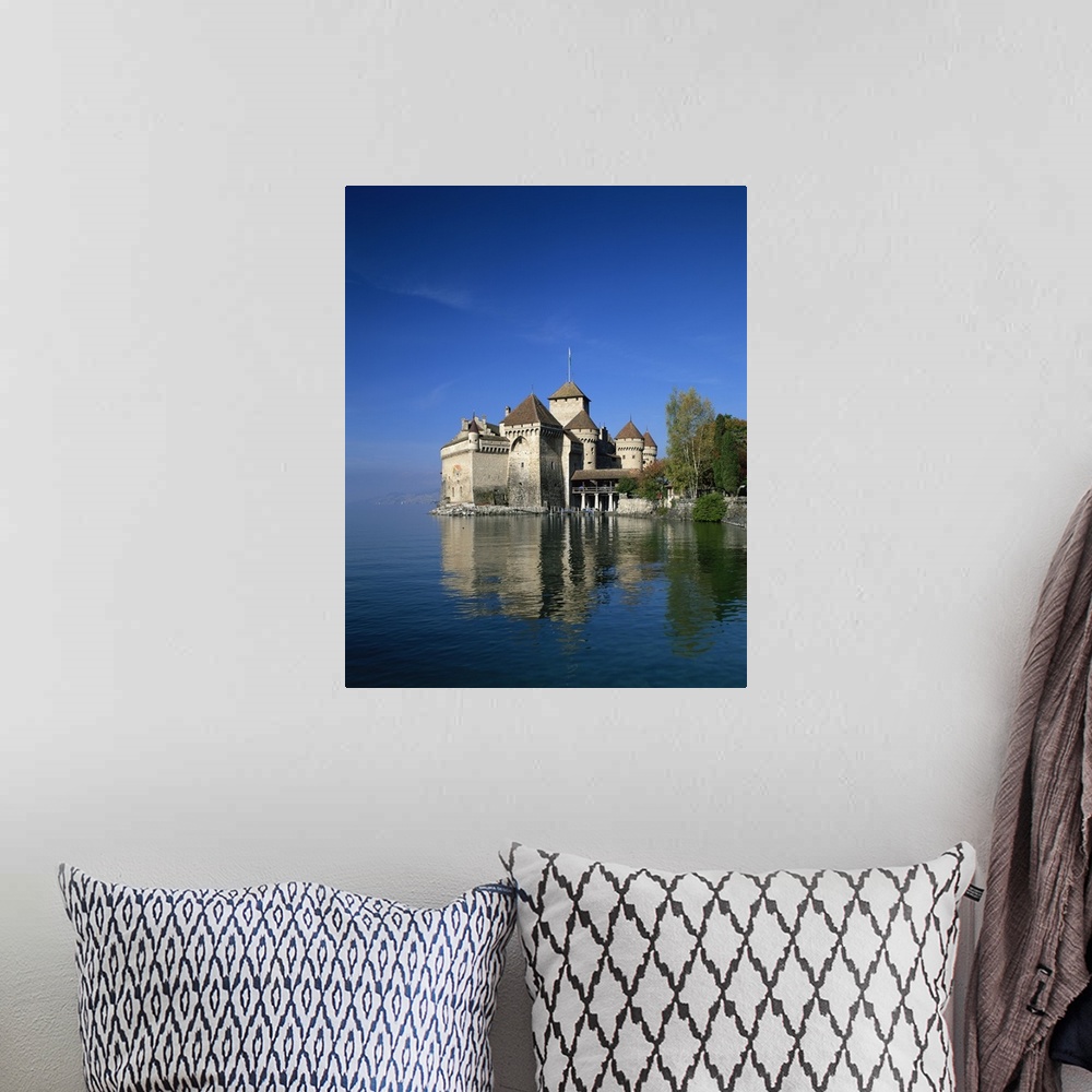 A bohemian room featuring The Chateau de Chillon on Lake Geneva, Switzerland