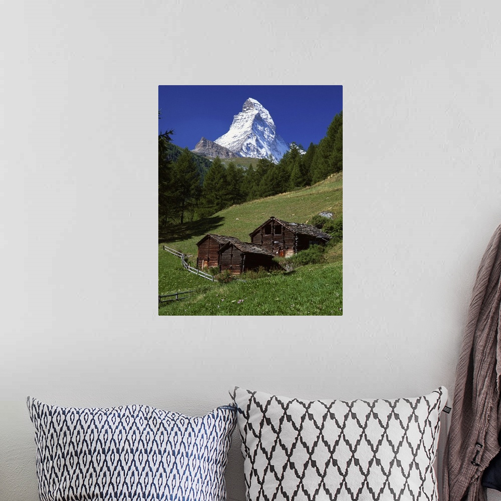 A bohemian room featuring The Matterhorn towering above green pastures, Zermatt, Valais, Switzerland