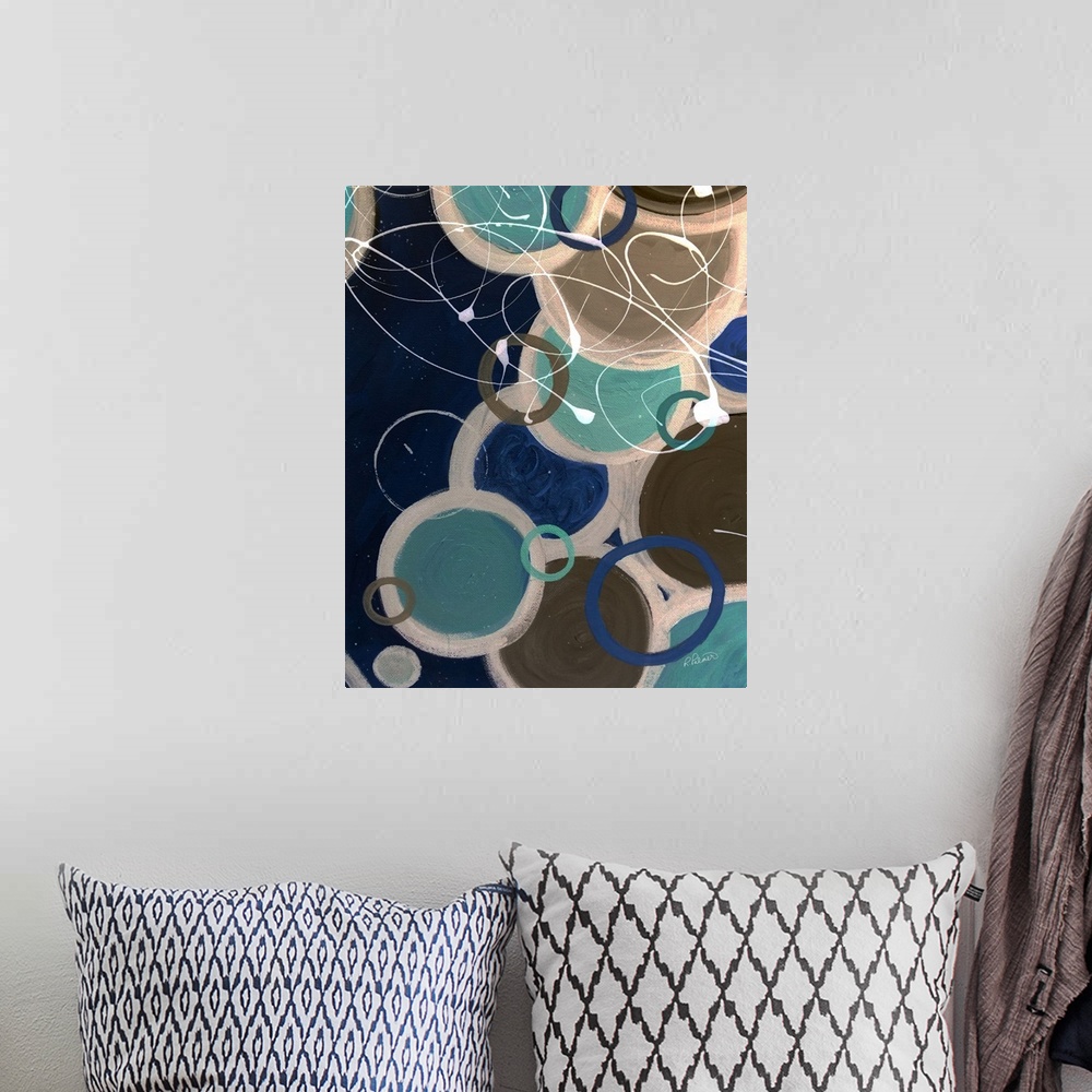A bohemian room featuring A contemporary abstract painting using circle and paint drizzle in mute tones.