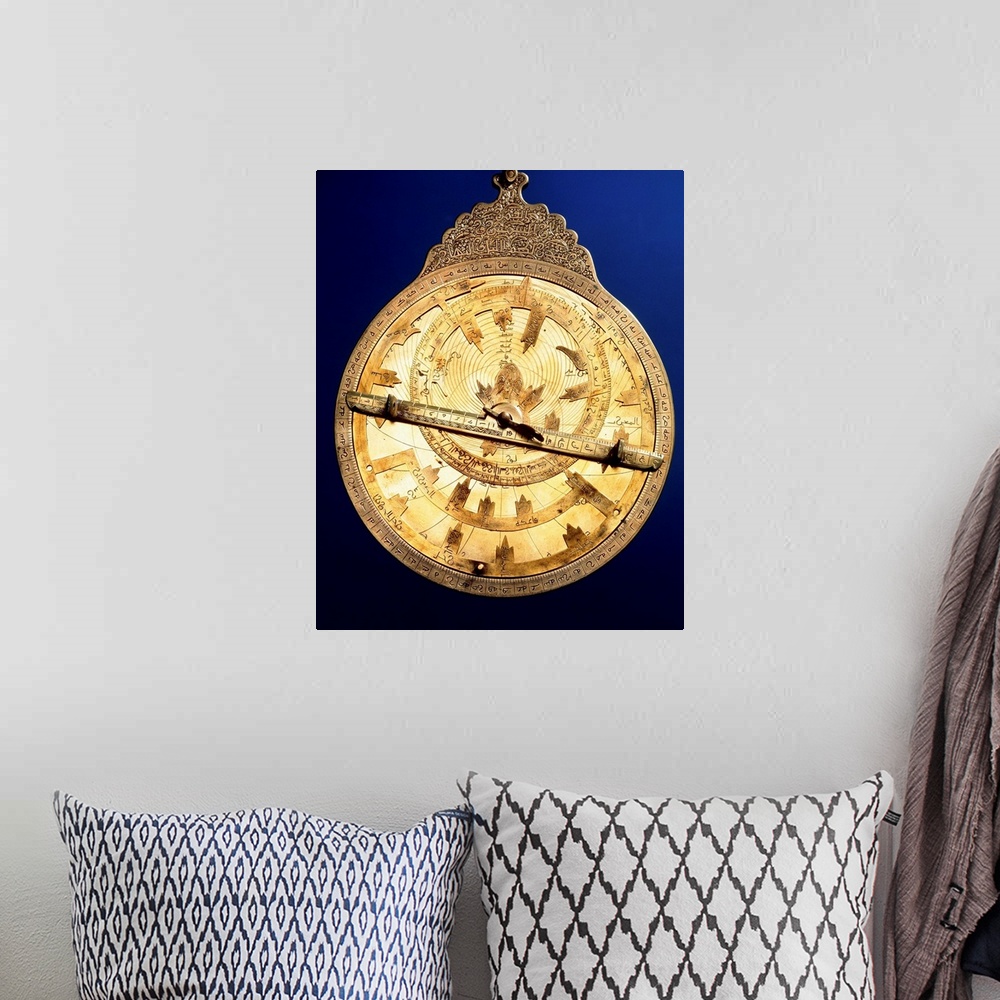 A bohemian room featuring Astrolabe. Brass astrolabe from the middle ages. The astrolabe consists of circles marked with an...