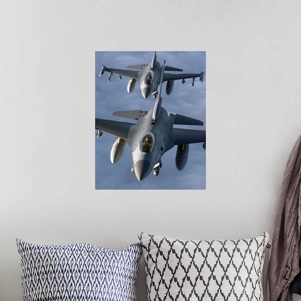 A bohemian room featuring Two F16 Fighting Falcons fly in formation