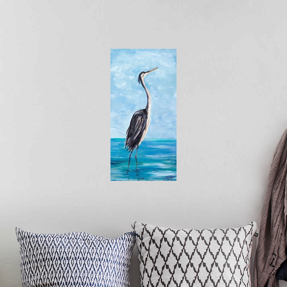 A bohemian room featuring Contemporary painting of a heron wading through sea water.