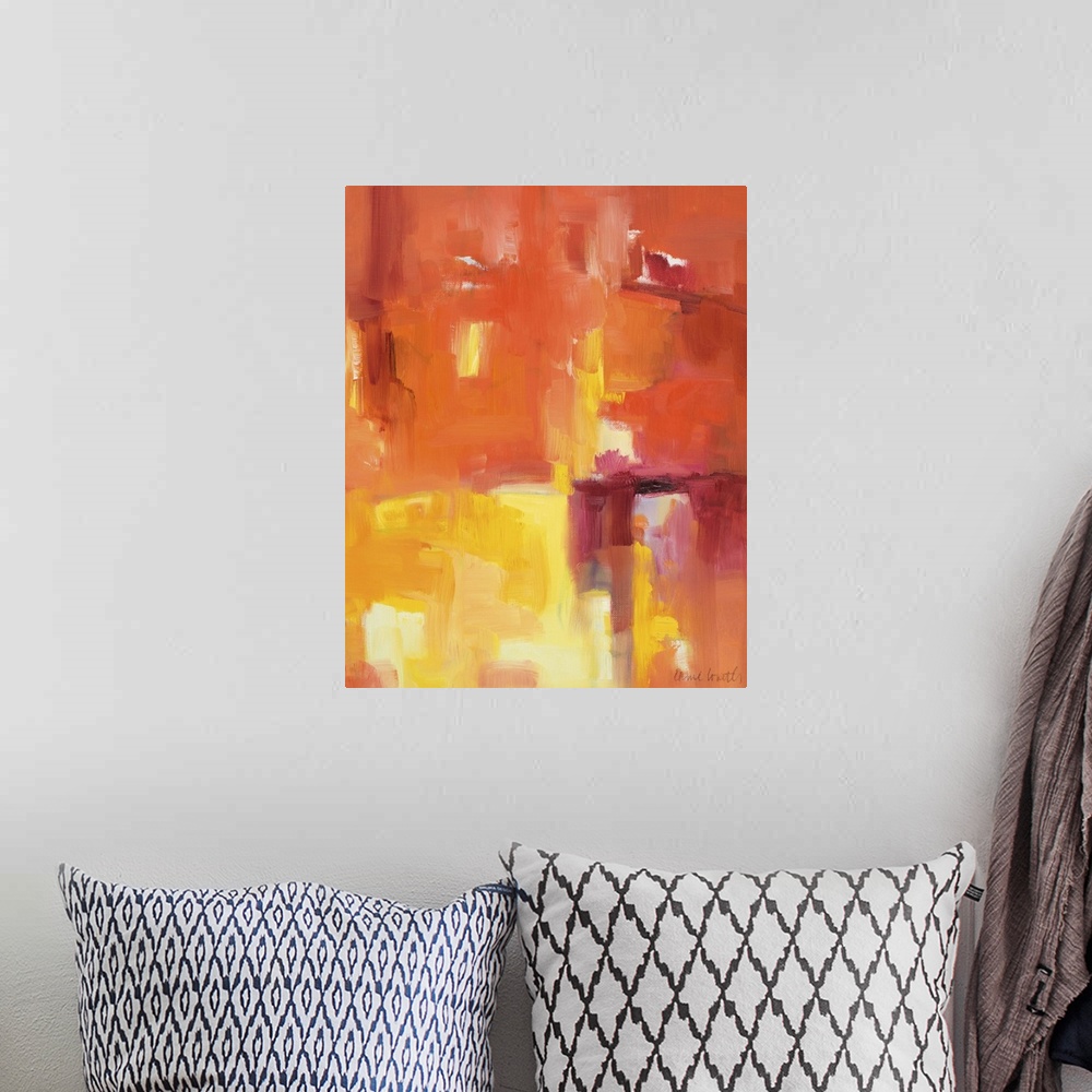 A bohemian room featuring Fiery abstract artwork in bright orange and red tones.