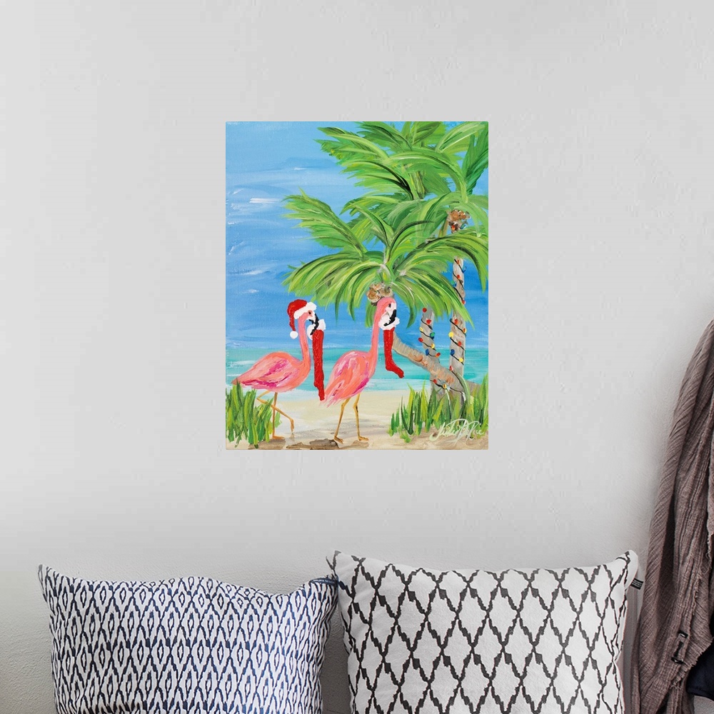 A bohemian room featuring Fun tropical Christmas themed painting of two pink flamingos carrying stockings in their beaks to...