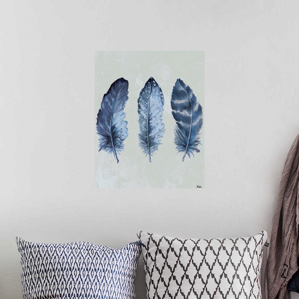 A bohemian room featuring Painting of three dark blue feathers of varying patterns.