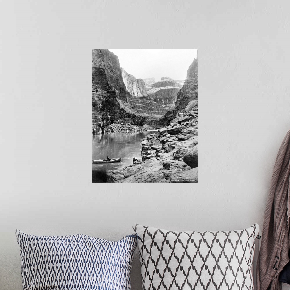 A bohemian room featuring Grand Canyon, C1913. A View Of the Grand Canyon In Arizona, Showing A Man In A Boat On A River In...