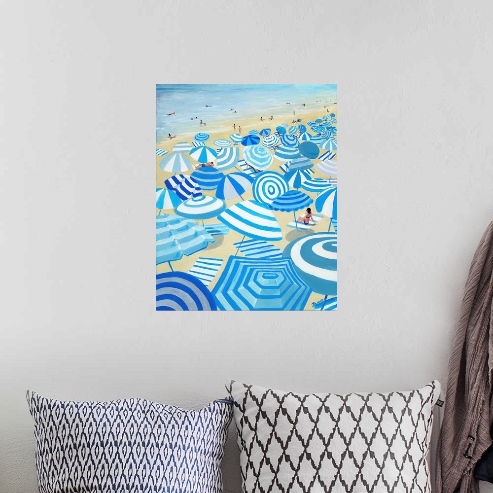 A bohemian room featuring A fun and lighthearted painting of blue and white striped umbrellas on a crowded beach. Whimsical...