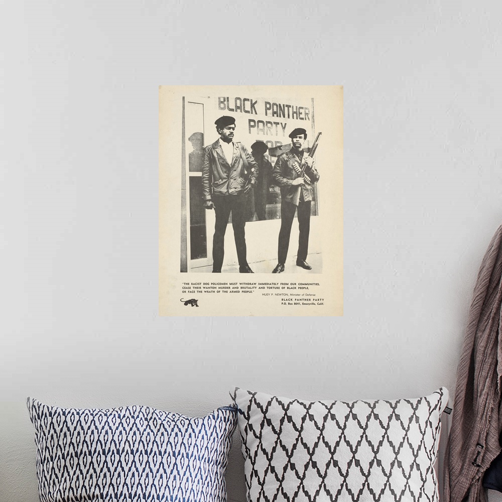 A bohemian room featuring Framed black and white poster of Huey Newton and Bobby Seale in front of the storefront headquart...