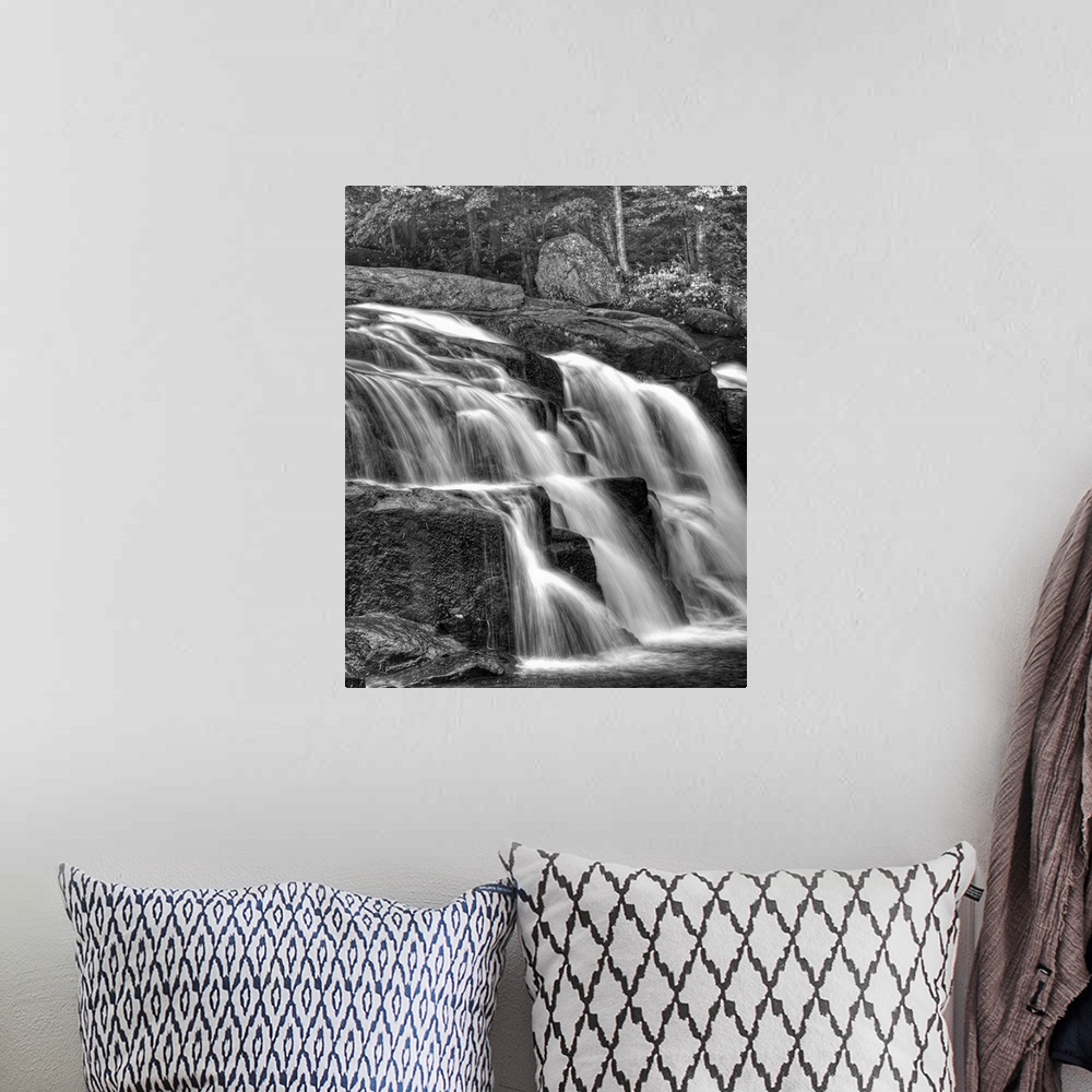 A bohemian room featuring Water flowing over rocks on a waterfall