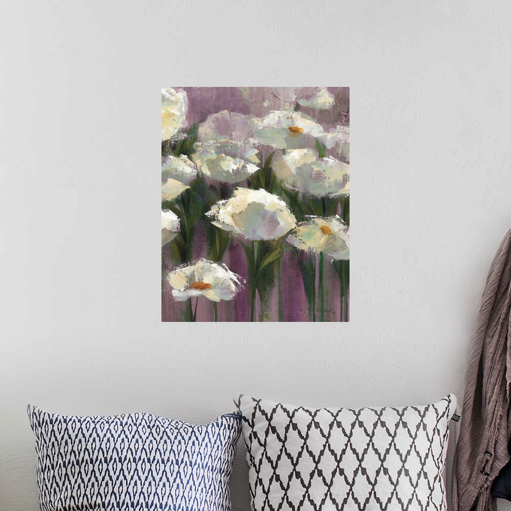 A bohemian room featuring Contemporary artwork of white flowers close-up in the frame of the image. Against a dark purple b...