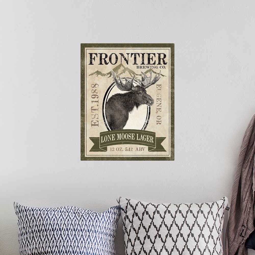 A bohemian room featuring Contemporary artwork of a wilderness themed brewery sign.