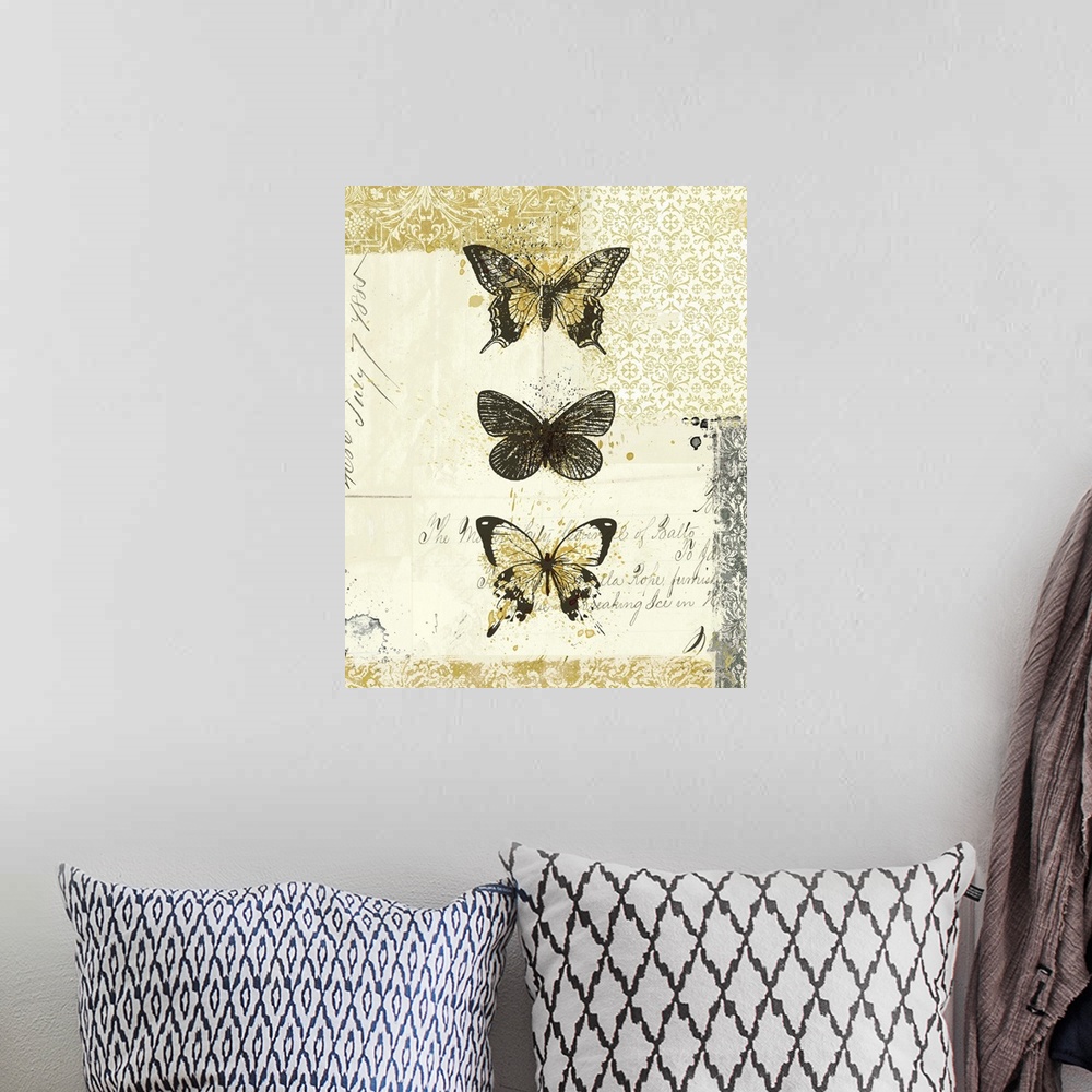 A bohemian room featuring Contemporary artwork of three insects lined from top to bottom, on golden and weathered looking b...
