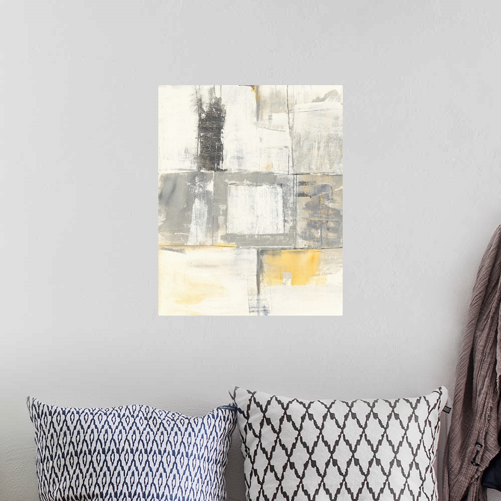 A bohemian room featuring A muted vertical abstract featuring square shapes and yellow accents.