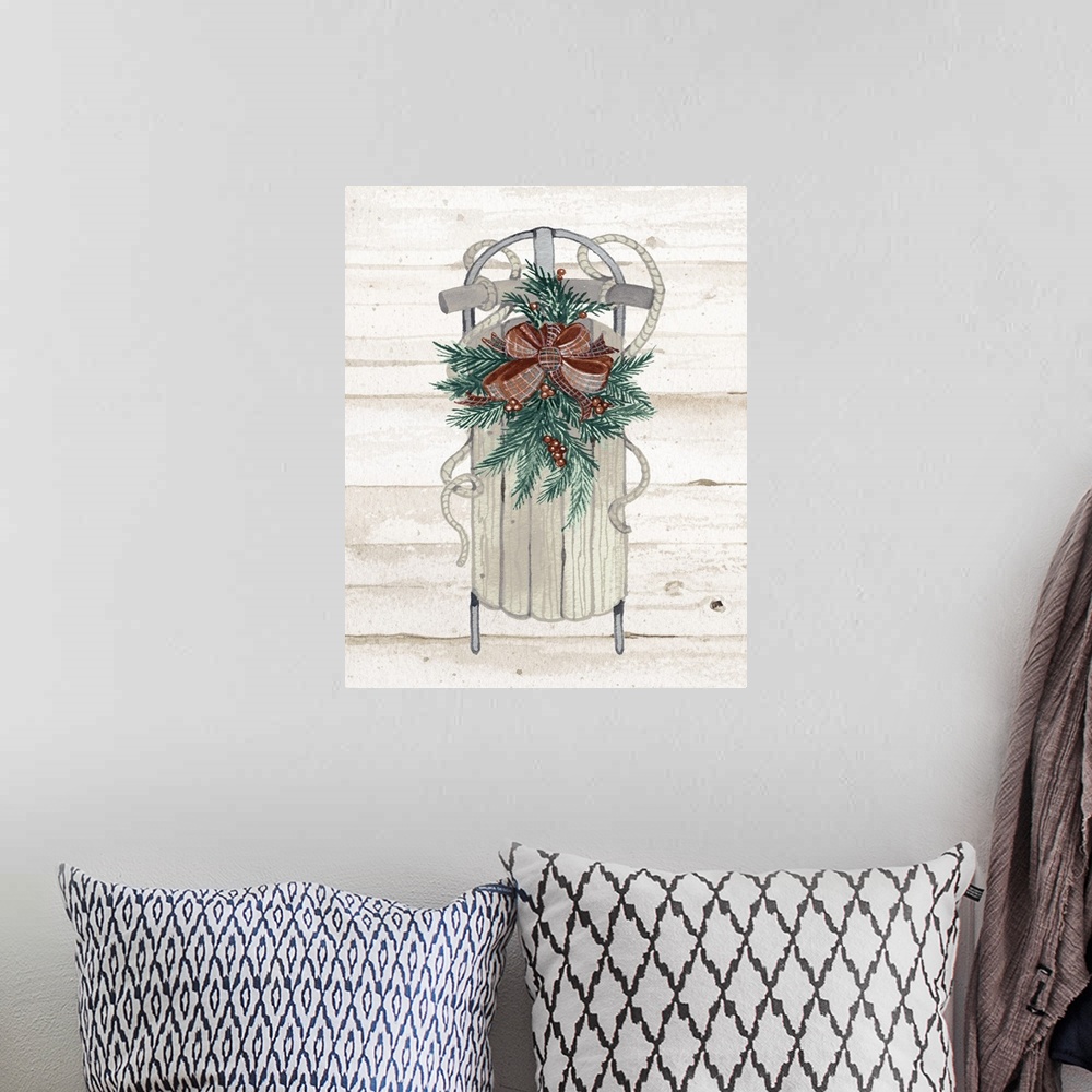 A bohemian room featuring Seasonal decor with a watercolor painted sled decorated with pine needles, berries, and a bow, on...