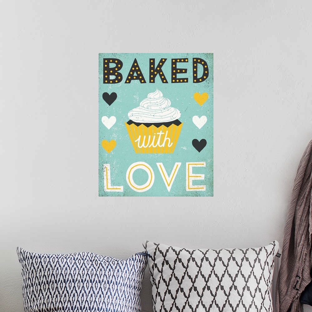 A bohemian room featuring Cute retro artwork of a cupcake with the words "Baked with Love" and hearts.