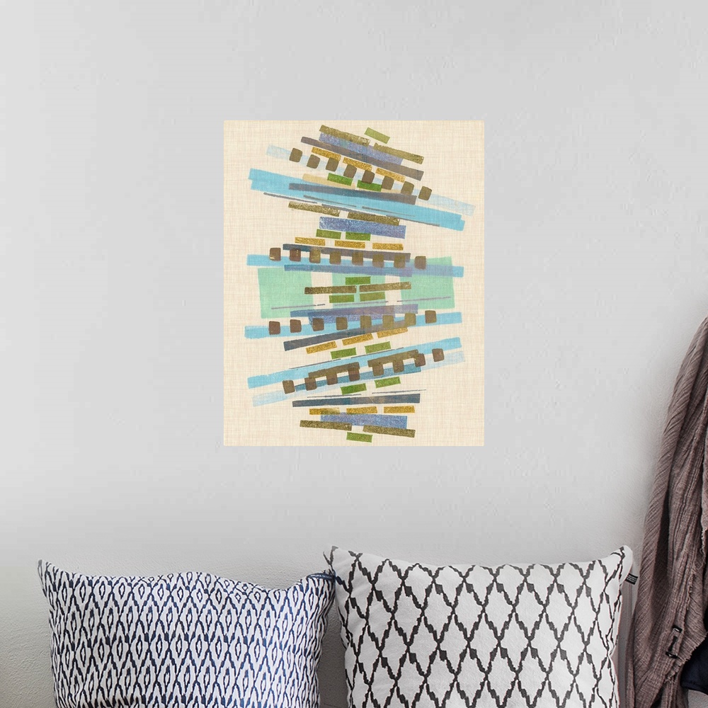 A bohemian room featuring Mid-century inspired abstract artwork using muted colors in stacked rectangular shapes.