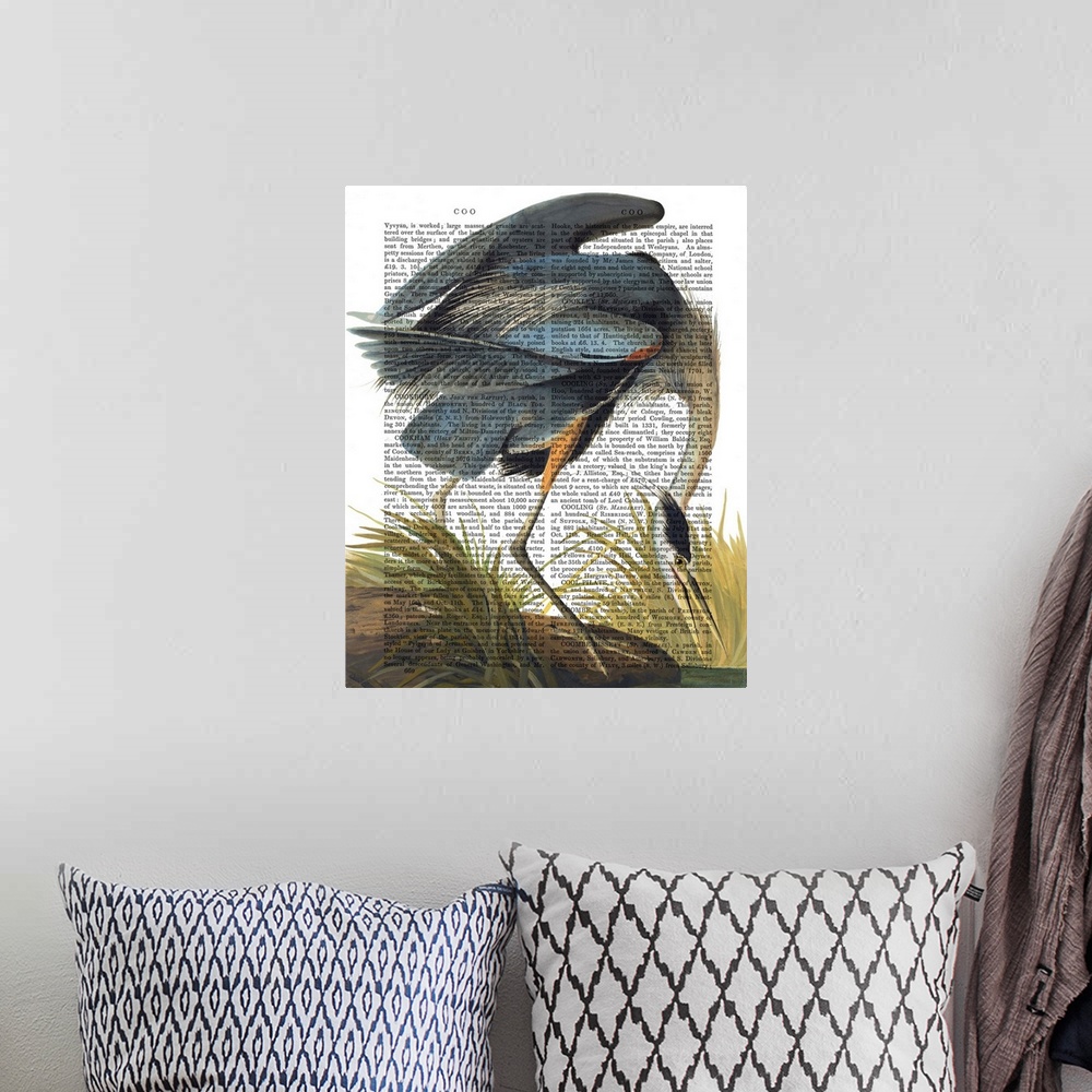 A bohemian room featuring A blue heron painted over a vintage dictionary page.