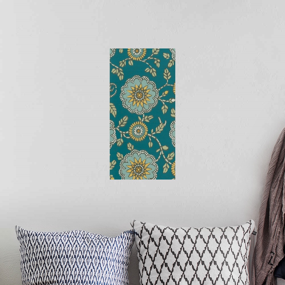 A bohemian room featuring Decorative floral patterned artwork using blue and green tones.
