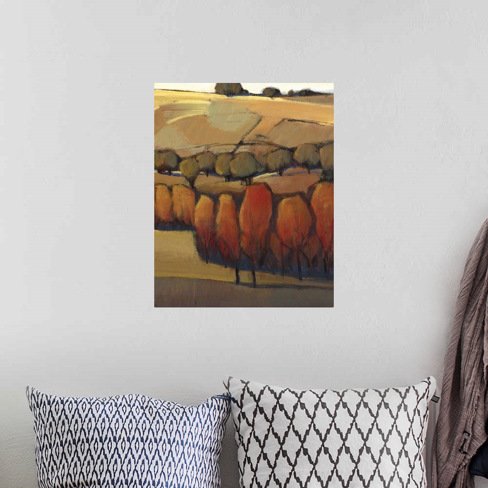 A bohemian room featuring Contemporary painting in warm tones of a rural landscape in autumn.