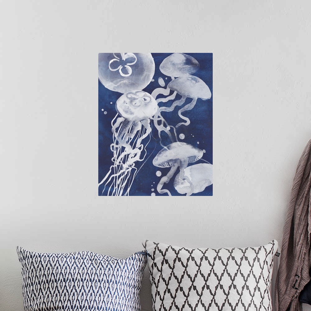 A bohemian room featuring Painting of several white jellyfish swimming in the ocean.