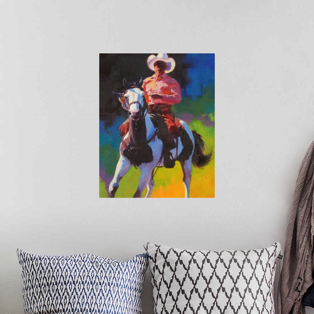A bohemian room featuring Contemporary painting of a cowboy atop of a brown and white paint horse.