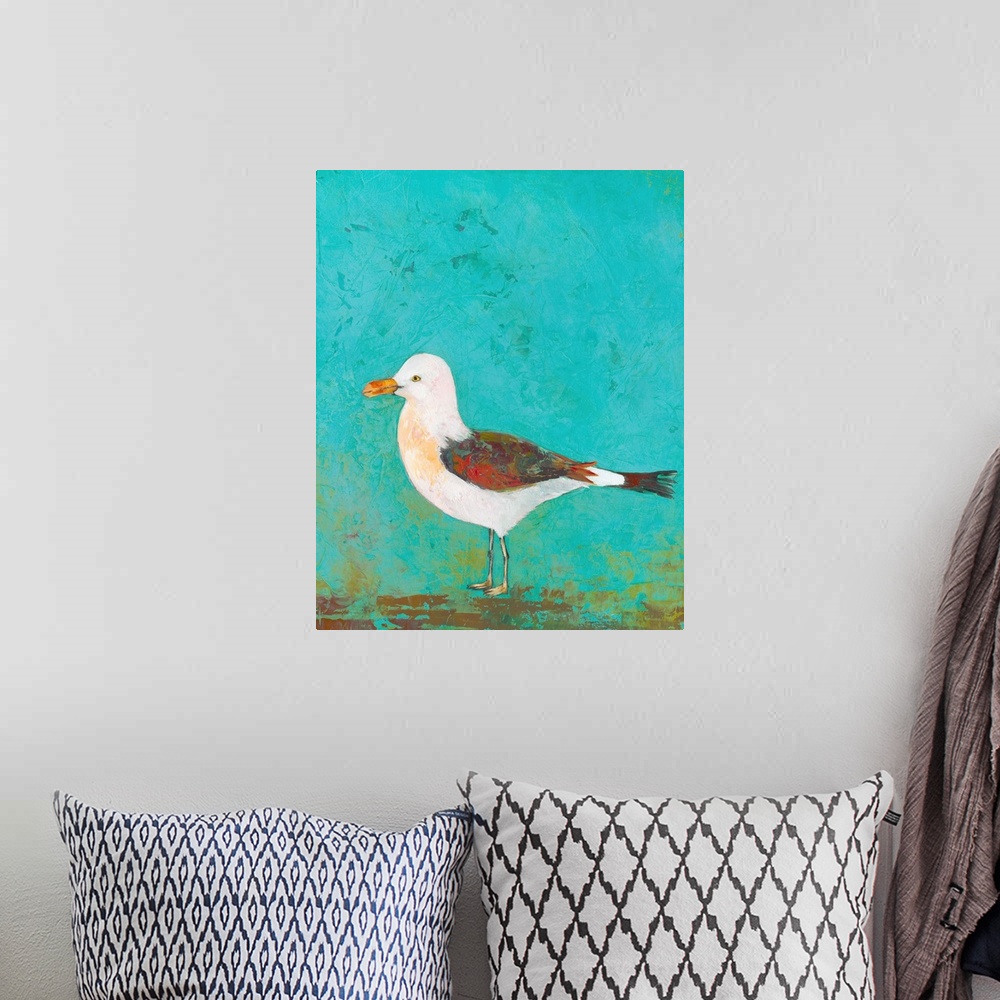 A bohemian room featuring Contemporary painting of a seagull against a blue background.