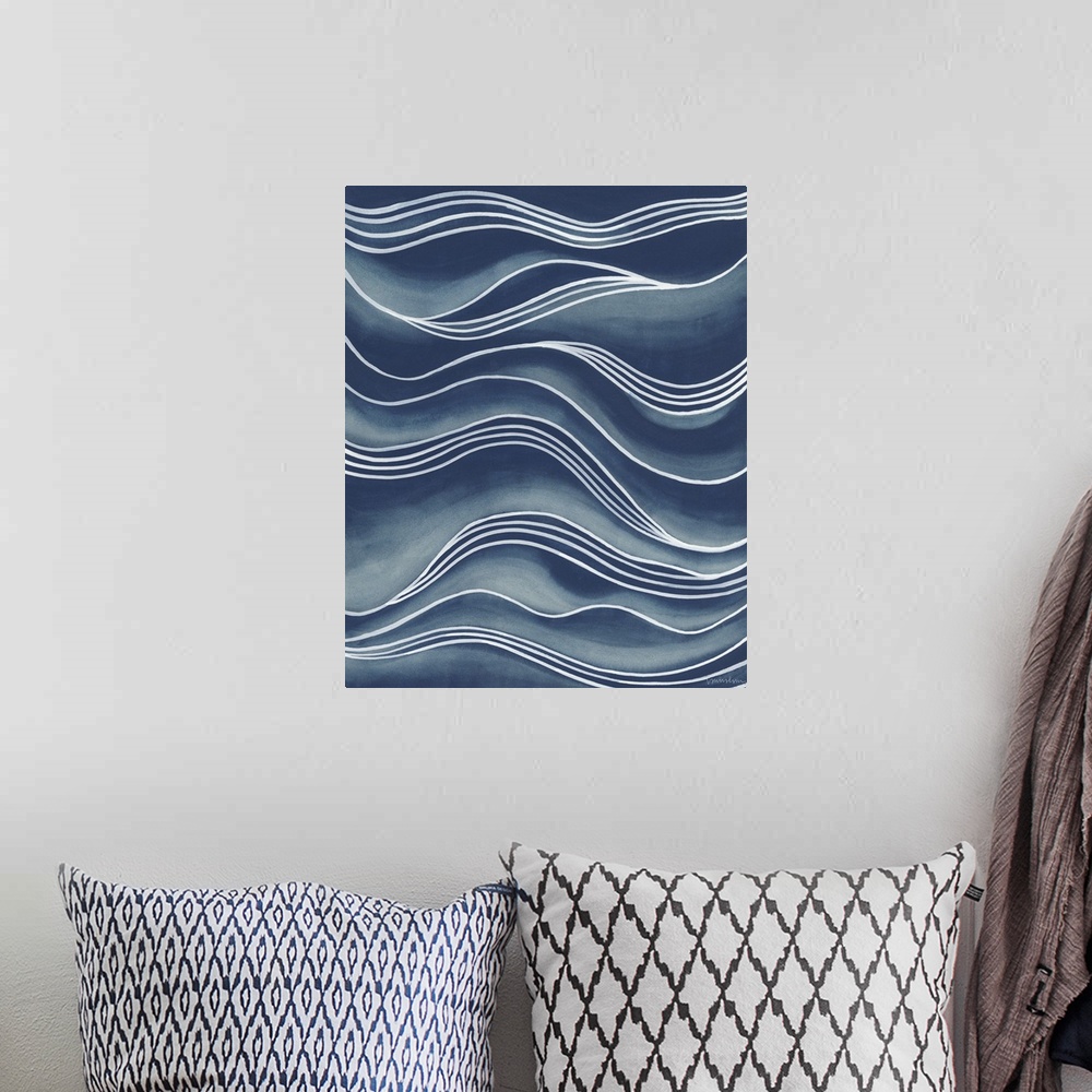 A bohemian room featuring Wavy white lines over shades of blue create the illusion of rolling waves.