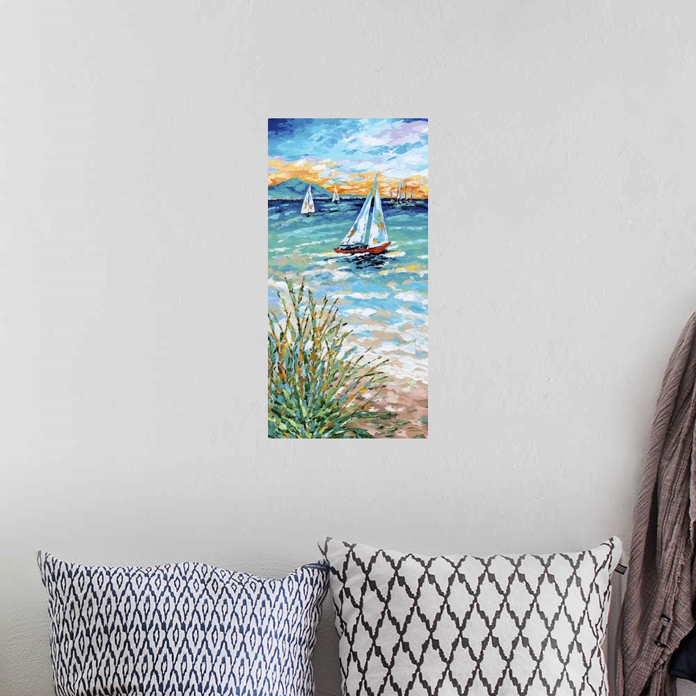 A bohemian room featuring Contemporary ocean scene with three sailboats on the sea and beach grass on the shore.