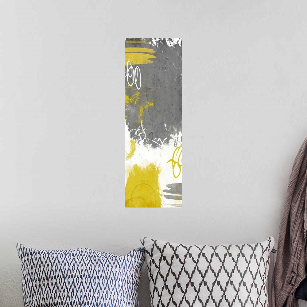 A bohemian room featuring Vertical contemporary abstract art in shades of white, grey, and yellow.