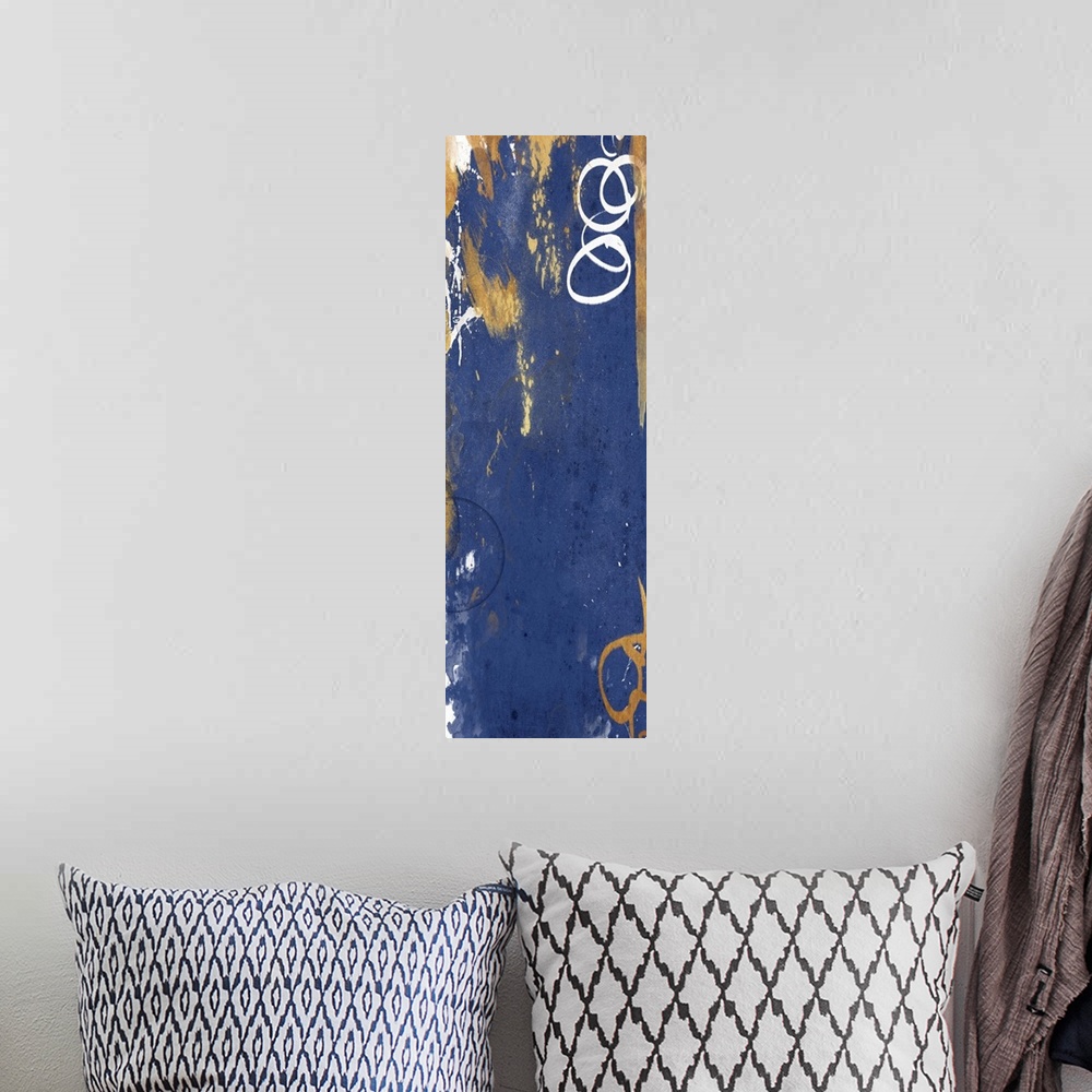 A bohemian room featuring Vertical contemporary abstract art in shades of gold and navy.